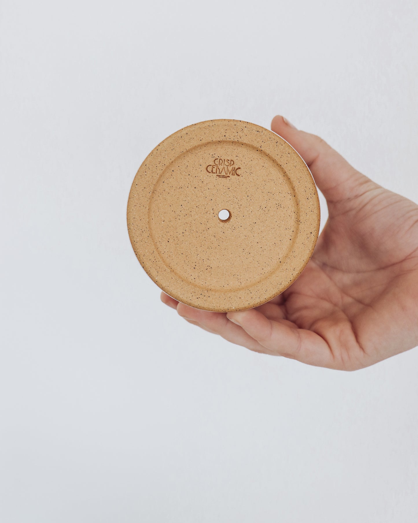 Bottom view of white and turquoise art deco planter handmade by Crisp Ceramic on a potters wheel.
